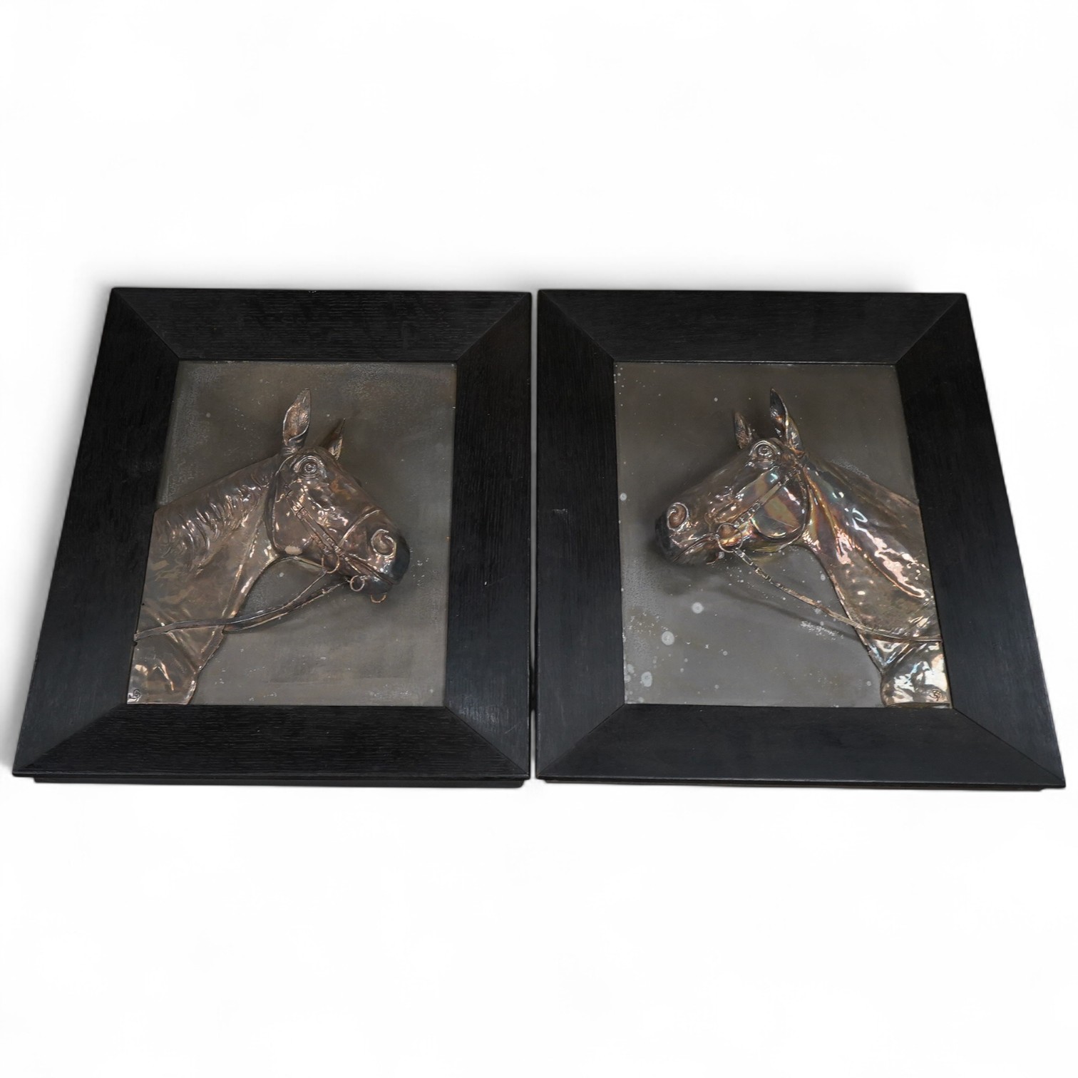 After Georg G Bommer, a pair of framed white metal relief plaque, study of a horse